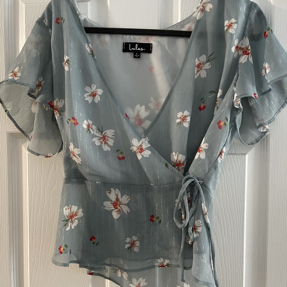 Size L light blue wrap top from Lulu’s.